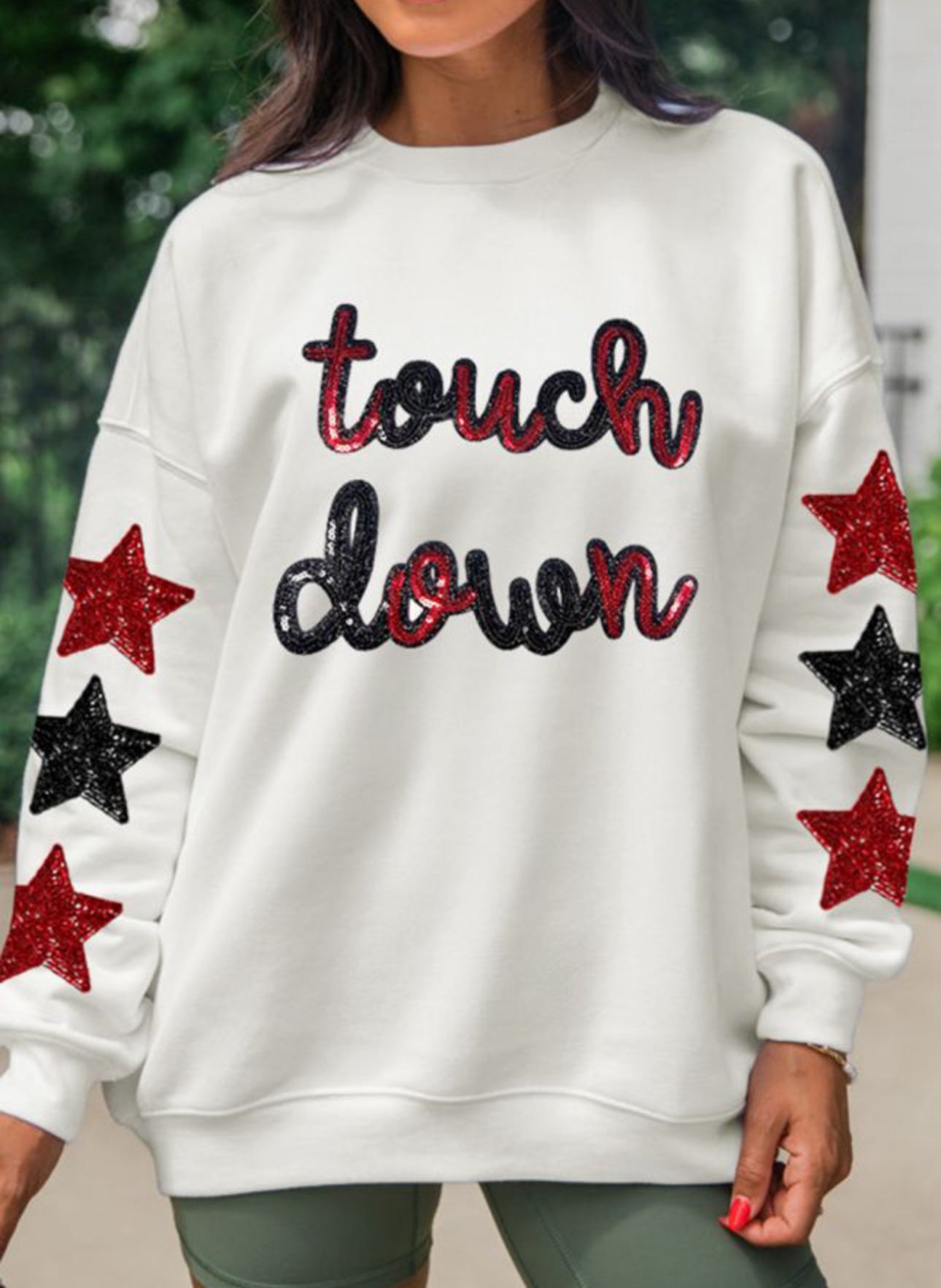 Sequin touch down sweatshirt